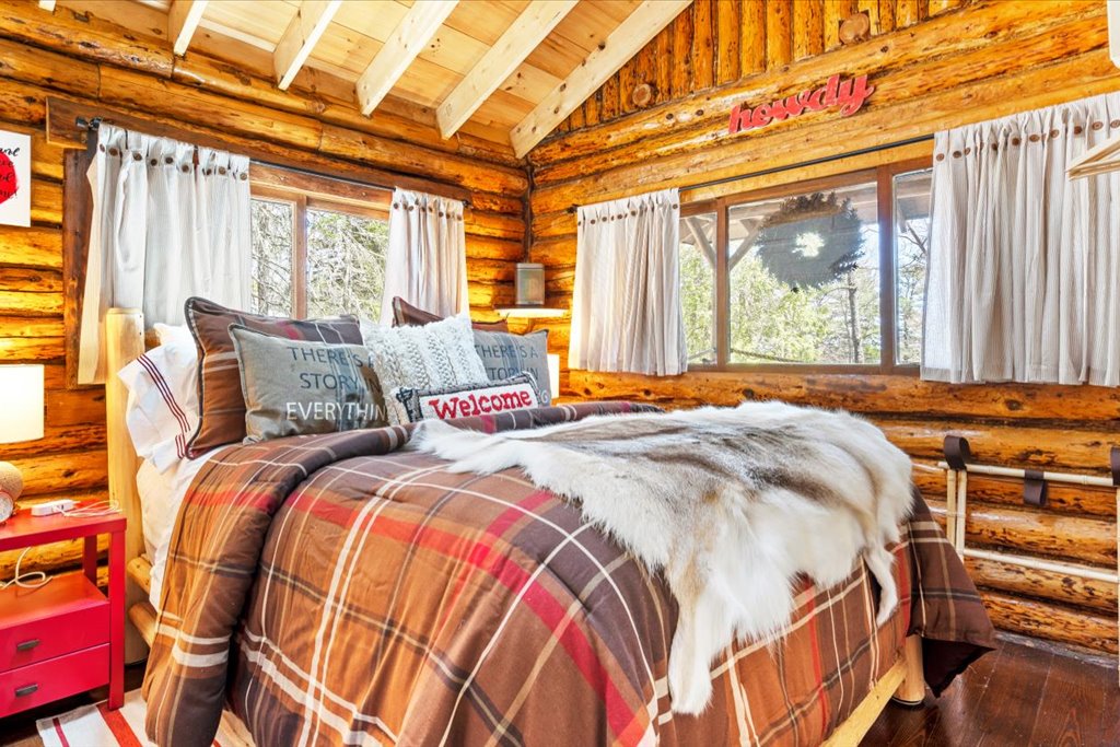 Rustic Bedroom with log bed frame and Queen Mattress